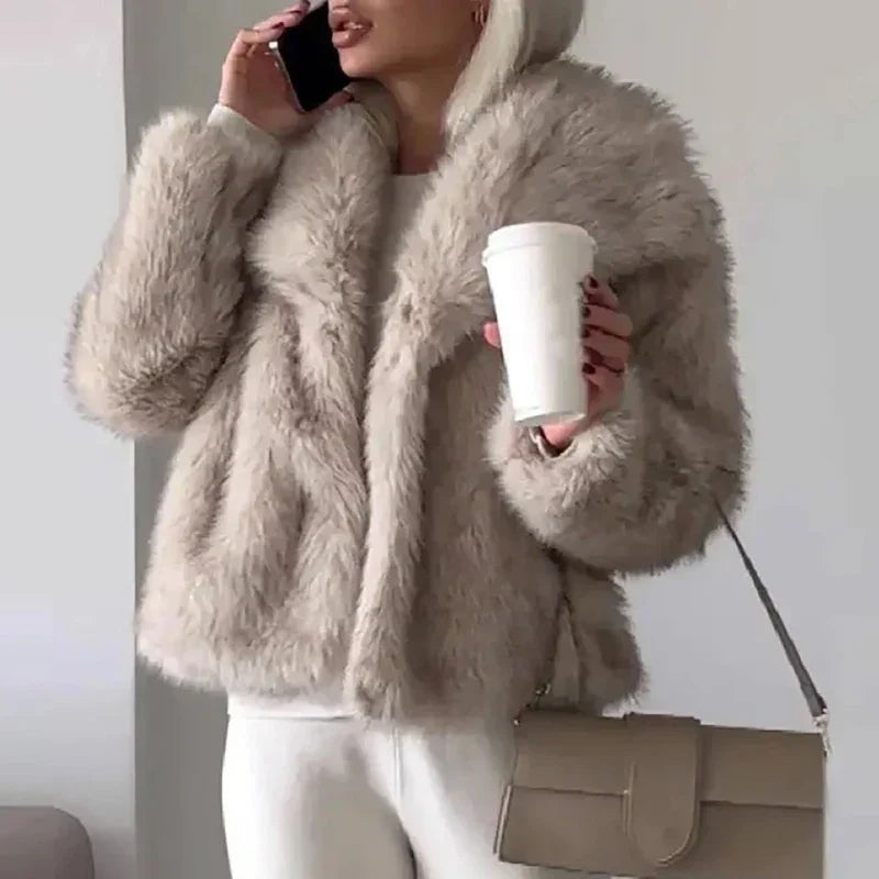 Comfortable Pink Faux Fur Coat for Women with Collared Oversized Fit Relaxed Fit Plush Winter Style